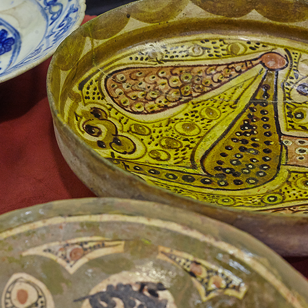 Close up of antique hand painted Islamic bowls
