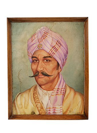 portrait of an Indian man with pink turban