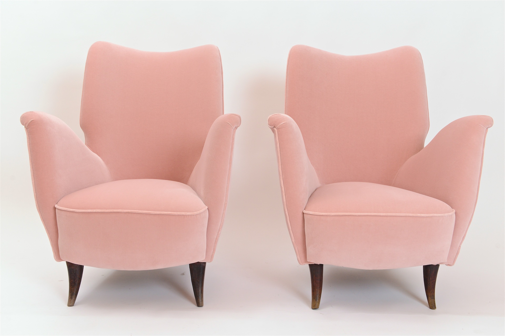 Pair of pink velvet upholstered armchairs