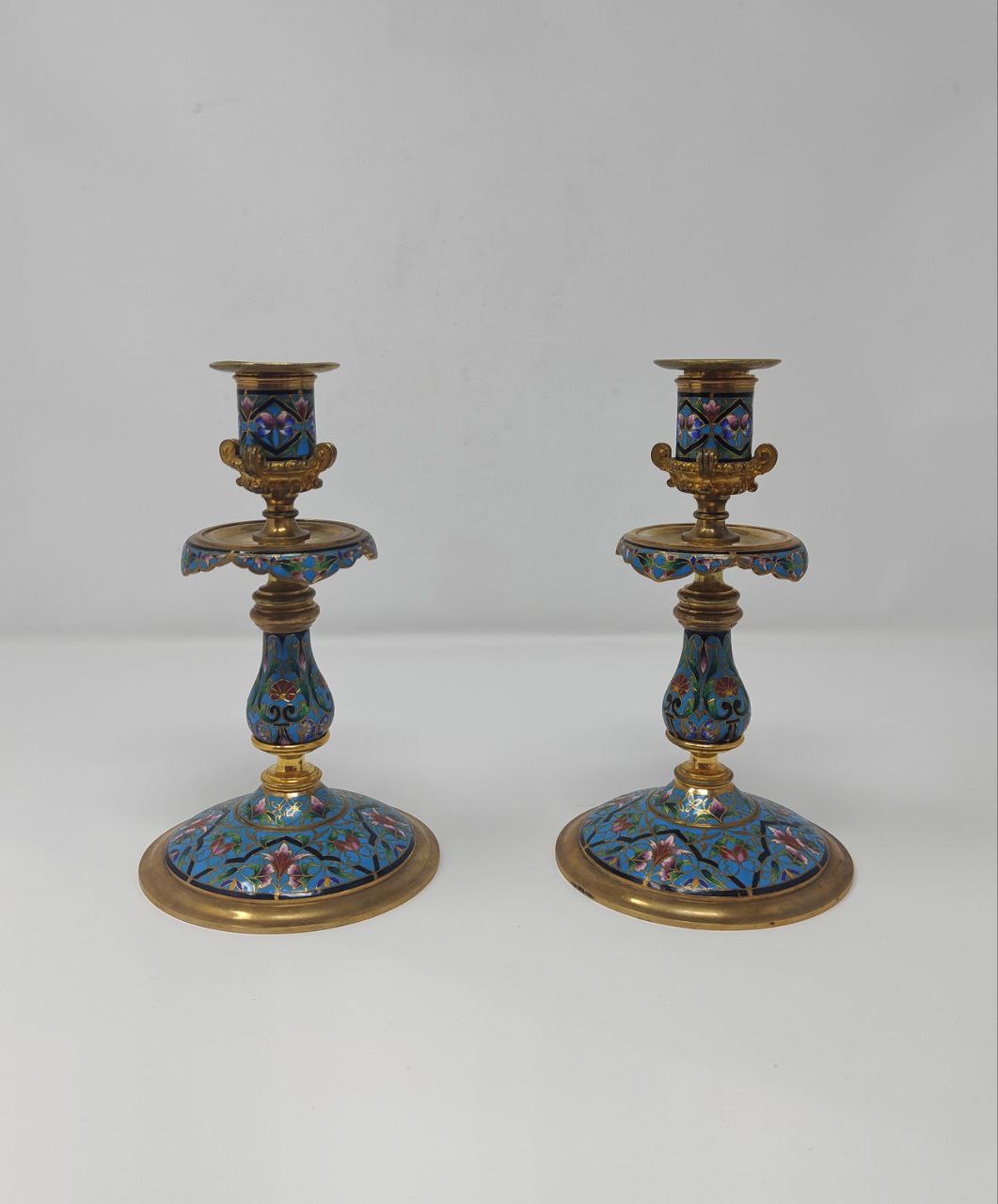 Pair of Champleve enamel and bronze Candle stick holders
