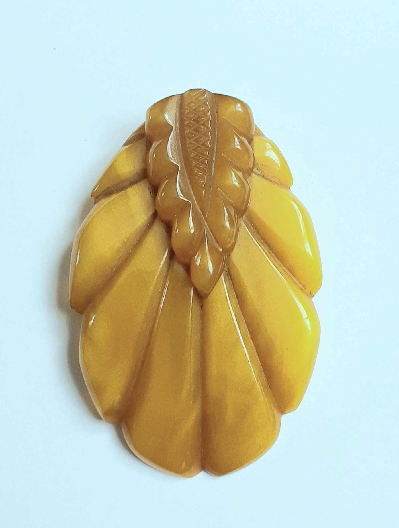 yellow bakelite dress clip